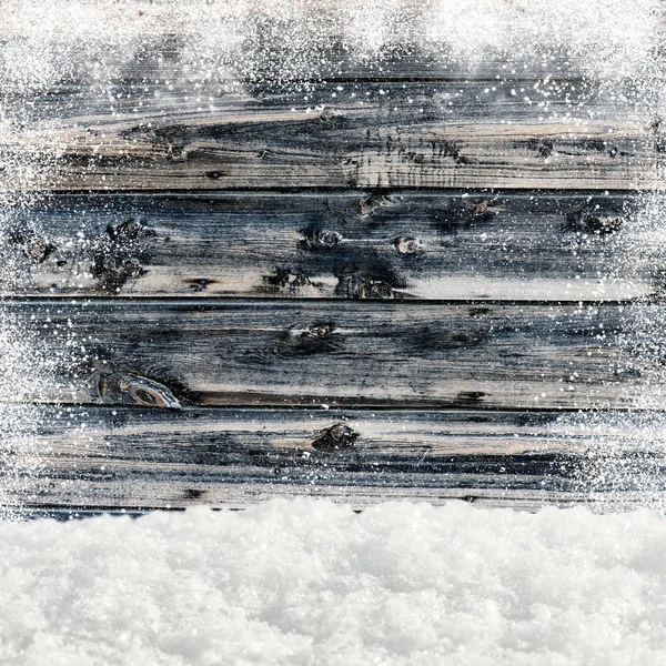 Snowdrifts. In the background old wooden wall with blank space — Stock Photo, Image