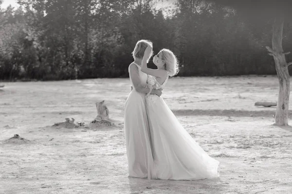 Lesbian couple wedding on white sand, wear masks to prevent epidemic COVID-19