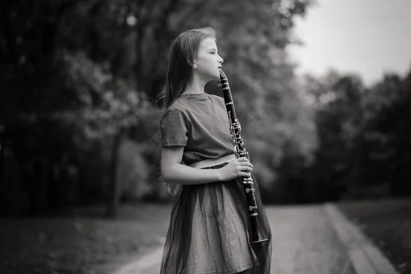 Young Attractive Girl Playing Clarinet Fall Park — Stock Photo, Image