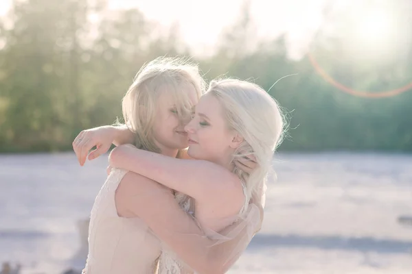 Two Brides Women White Dress Blonde Hair Hugging Each Other — Stock Photo, Image