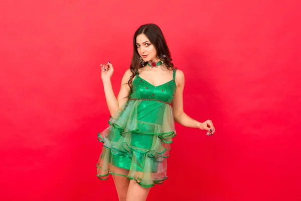 Young Woman Sexy Christmas Tree Costume Red Background Studio — Stock Photo, Image