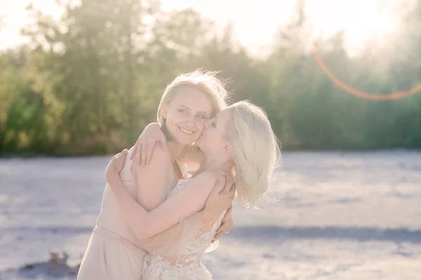 Two Brides Women White Dress Blonde Hair Hugging Each Other — Stock Photo, Image