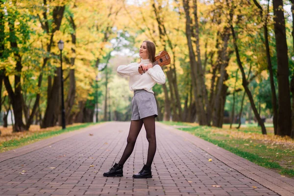 Young Woman Sitting Bench Park Playing Ukulele Posing Guitar — Stock Photo, Image