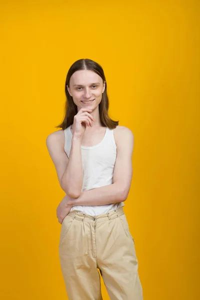 Androgynous Beautiful Young Man Model Tests Yellow Background — Stock Photo, Image