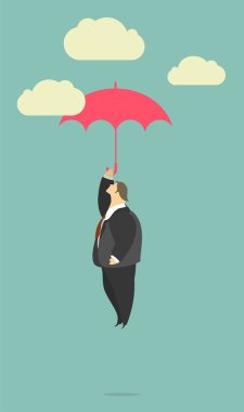 Açık havada bir şemsiye tutan işadamı