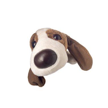 Beyaz arka planda yumuşak oyuncak köpek