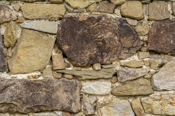 Helfaset Steinmur Tett Inntil Bilde – stockfoto