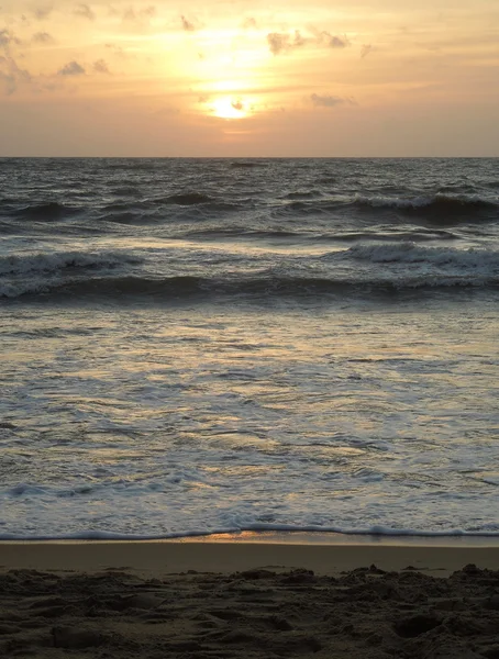 Atardecer en la playa — Foto de Stock