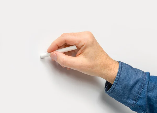 Mão com lápis de cor branco — Fotografia de Stock