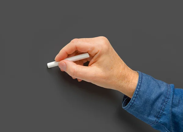 Hand with white crayon — Stock Photo, Image