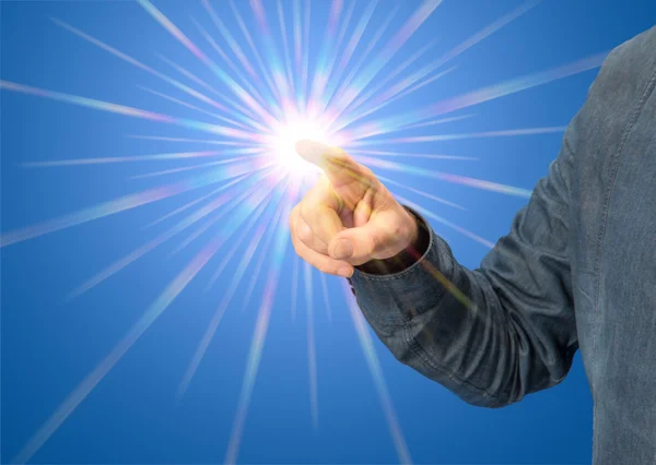 Pointing male hand with starlight in blue back — Stock Photo, Image