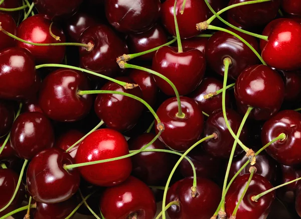 Full frame background showing lots of red cherries — Stock Photo, Image
