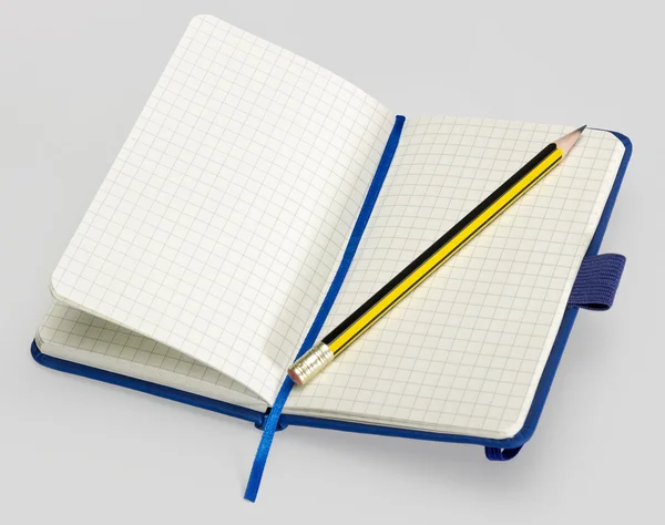 Open notebook and pencil — Stock Photo, Image