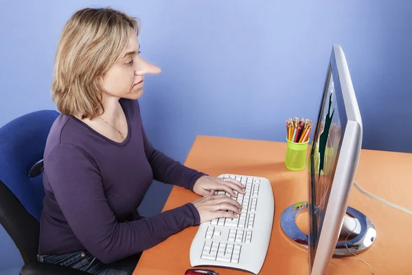 Woman with long nose sitting in his office