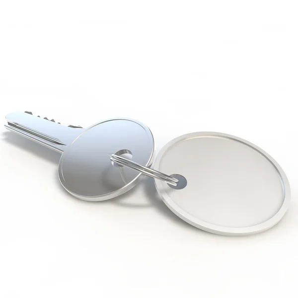 La chiave con tag su sfondo bianco isolato — Foto Stock