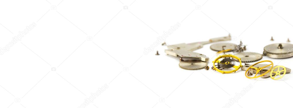 Watch details, movement, on a white isolated background. Macro scale. Banner format