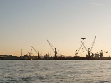 industrial port with ship and heavy duty crane brindisi.