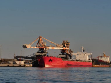 industrial port with ship and heavy duty crane brindisi.