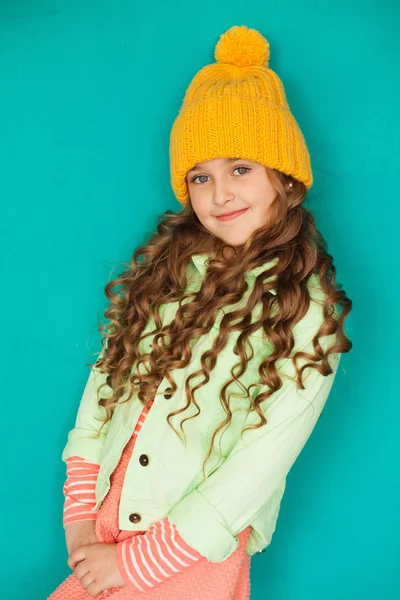 Beautiful little lady in yellow woolen cap — Stock Photo, Image