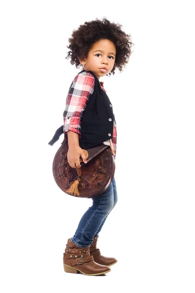 Elegante niña con bolsa de cuero — Foto de Stock