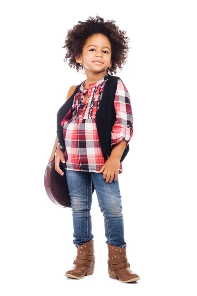 Стильна маленька дівчинка зі шкіряною сумкою — стокове фото