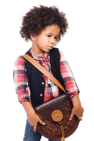 时尚的小女孩，与民间的皮包 — 图库照片