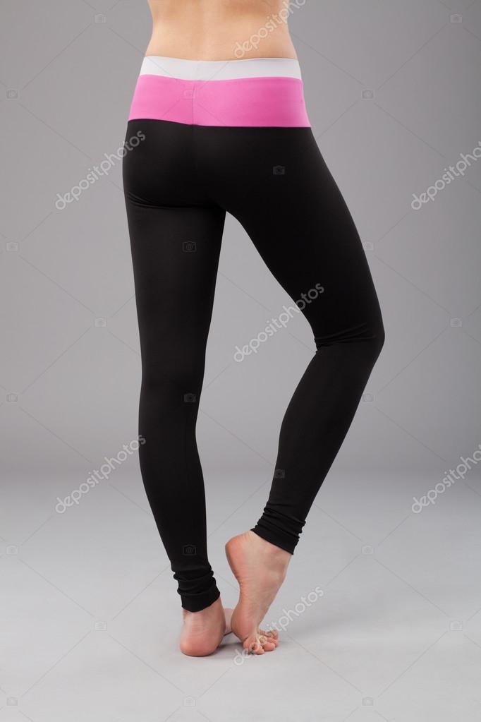 Girl with perfect legs posing in leggings Stock Photo