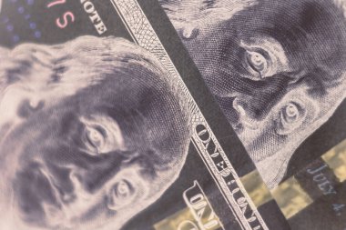 Close up Franklin's face on a one hundred dollar. American, US Dollars Cash Money in negative. Background pattern for design.	