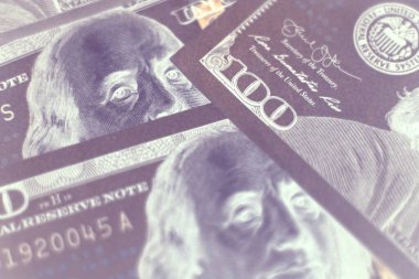 Close up Franklin's face on a one hundred dollar. American, US Dollars Cash Money in negative. Background pattern for design.	
