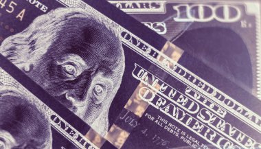 Close up Franklin's face on a one hundred dollar. American, US Dollars Cash Money in negative. Background pattern for design.	