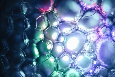 Güzel, soyut sabun köpüklerini kapatın. Tasarım için arkaplan modeli. Makro fotoğrafçılık görünümü.