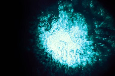 Güzel soyut sürrealite mavi ışık pastel dokular girdap şeklinde kara büyü. Tasarım için arkaplan modeli. Makro fotoğrafçılık görünümü