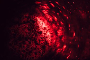 Beautiful multi colored abstract bokeh optical light bokeh on a dark background.	