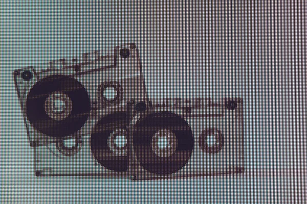ネオンライトの美しいオーディオカセットテープ ミニマリズムレトロなスタイルのコンセプト 80年代 デザインの背景パターン マクロ写真ビュー ピクセルのクローズアップ — ストック写真
