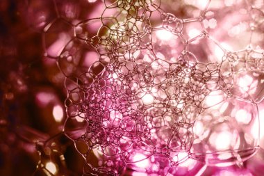 Güzel, soyut sabun köpüklerini kapatın. Tasarım için arkaplan modeli. Makro fotoğrafçılık görünümü.