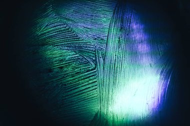 Işık pastel bir kara büyü üzerinde güzel soyut gerçeküstü doku. Tasarım için arkaplan modeli. Makro fotoğrafçılık görünümü