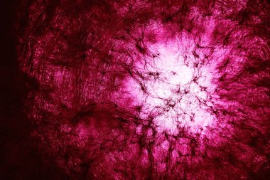 Mor ışıkta güzel soyut dokuma çemberi. Tasarım için arkaplan modeli. Makro fotoğrafçılık görünümü.