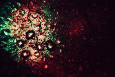 Soyutlama çok renkli su damlası. Tasarım için arkaplan modeli. Makro fotoğrafçılık görünümü.