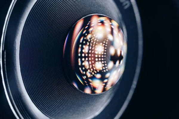 Beautiful abstract camera lens background multi colored glass reflection.