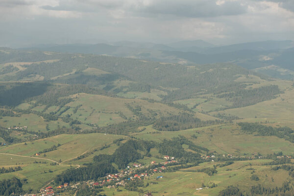 Carpatian summer landscape. Beautiful mountains on the blue sky background.