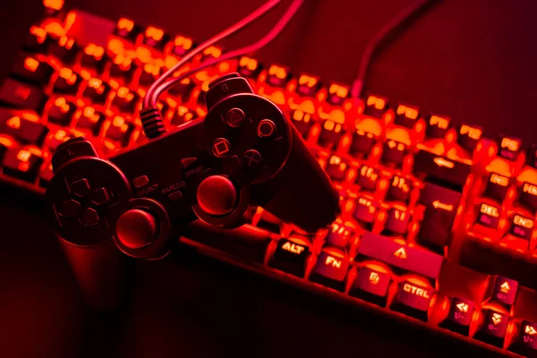 Black Gamepad Lying Mechanical Keyboard Red Backlight Leisure Concept Computer — Stock Photo, Image