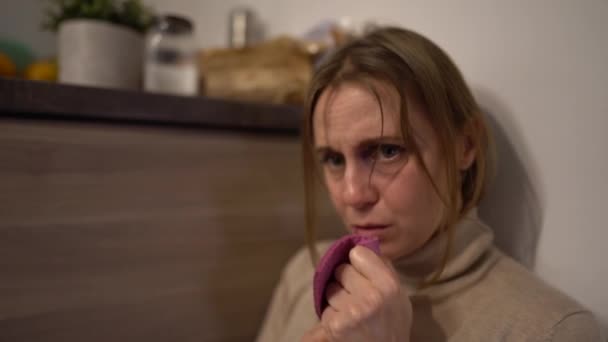 Husband beats wife. Woman stands in a corner afraid lifestyle is scared a man waves his fist at a woman at a family violence. Domestic violence concept clenched fist — Vídeo de Stock