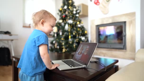 Grandparents wish little grandson Merry Christmas and Happy New Year via video link. New normal, stay at home concept — Stock Video