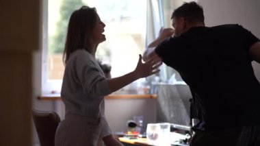 Parenting adolescents. Married couple scolds their teenage son in his room. The boy sits near the computer. Domestic violence and abuse concept