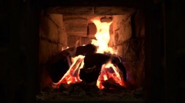 Wooden beams burning in Russian furnace looped
