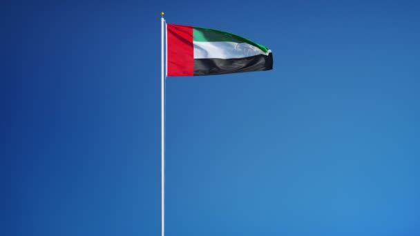 Yavaş çekimde Emirates bayrağı alfa ile sorunsuz bir şekilde döngüye saldı — Stok video