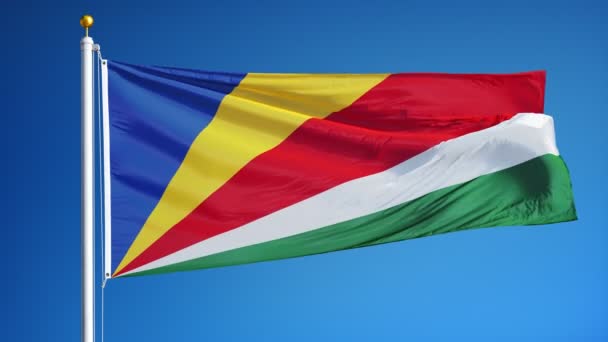 Bandeira das Seychelles em câmera lenta perfeitamente enrolada com alfa — Vídeo de Stock