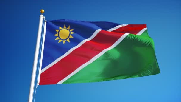 Флаг Намибии в замедленной съемке зациклен на альфе — стоковое видео