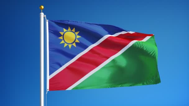 Bandera de Namibia en cámara lenta en bucle continuo con alfa — Vídeo de stock