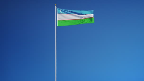 Vlajka Uzbekistánu v pomalém pohybu plynule tvořili s alfa — Stock video